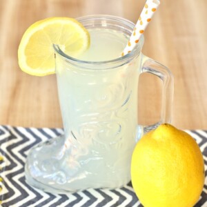 Glass boot of lemonade with a lemon.