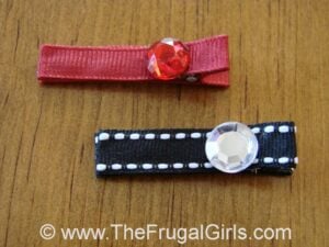 Red and black Christmas hair clips for babies.