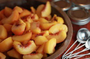 Bowl of peach wedges.