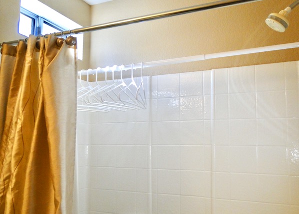 Add a Second Shower Rod for Extra Bathroom Storage