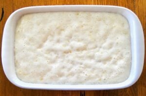 Batter for pineapple angel food cake in a baking dish.