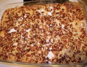 Apple pecan dump cake in a baking dish.