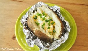 Baked potato with cheese, chives, and sour cream.