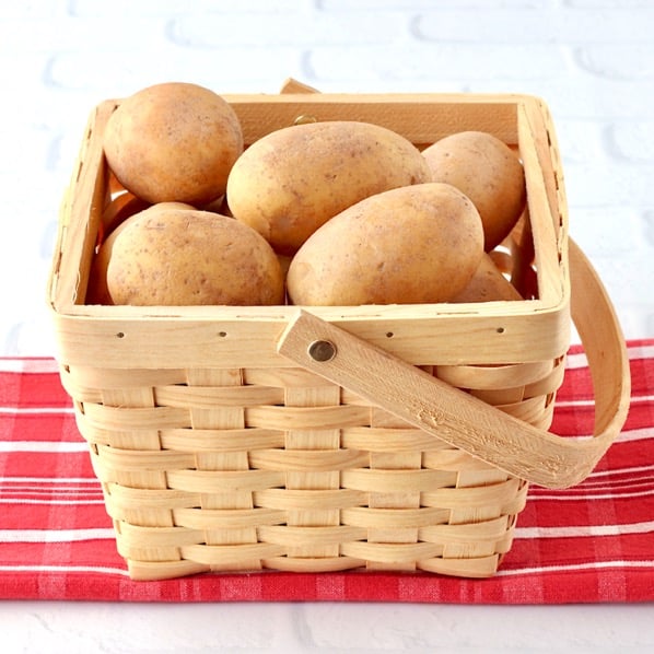 Russet potatoes in basket.