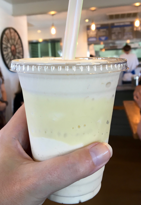 Banana milkshake in hand.