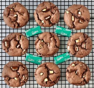 Andes Mint Chocolate Cookies on a wire rack with mints.
