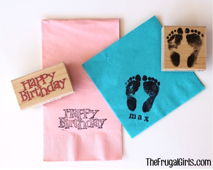 Pink and blue napkins with stamps.