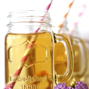 Sparkling White Grape Party Punch in a line of jars.