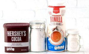 Ingredients including cocoa, French vanilla coffee creamer, and powder sugar.