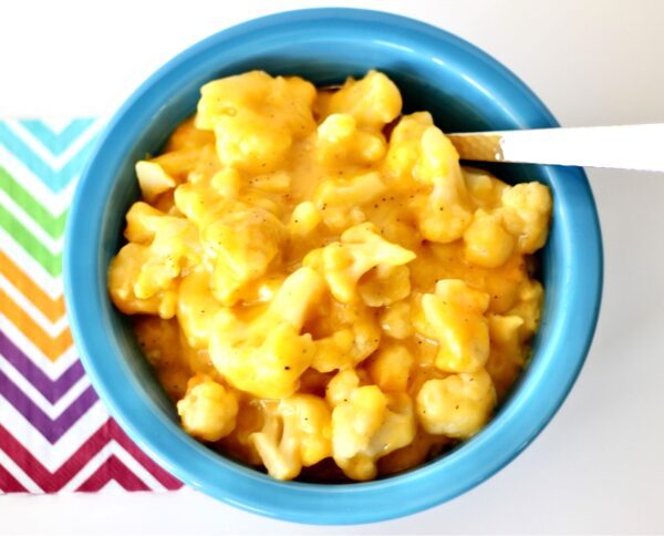 Cheesy Cauliflower in a bowl with a fork.