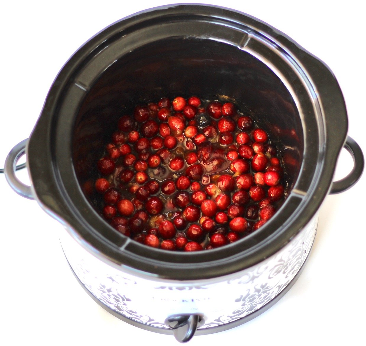Cranberry sauce in a slow cooker.