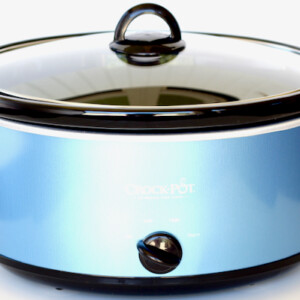 Light blue slow cooker with a lid.