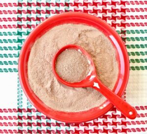 Spoon in a bowl of hot chocolate mix.