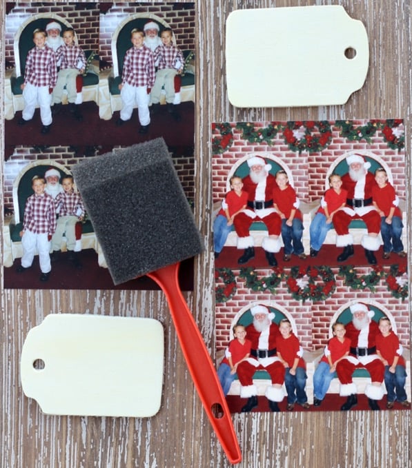 Supplies to make wooden photo ornaments.