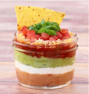 Individual Seven Layer Dip Cups Recipe at TheFrugalGirls.com