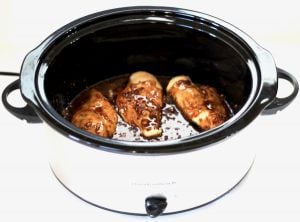 Asian sesame chicken in a slow cooker.