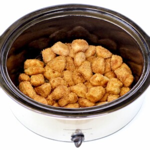 Monkey Bread piled in a slow cooker.