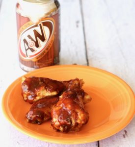 Root Beer Honey BBQ Wings on an orange plate.