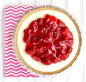 Cream cheese pie topped with strawberry filling.