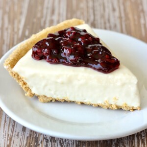 Slice of Blackberry Cream Cheese Pie on a plate.