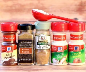 Ingredients including cumin, cayenne red pepper, and garlic salt.