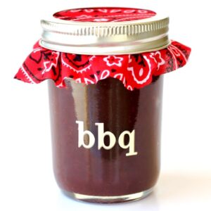 Barbecue sauce in mason jar labeled "bbq."