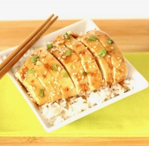 Plate of Honey Sesame Chicken over rice.