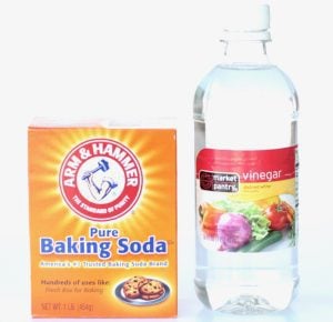 Bottle of vinegar and box of baking soda.