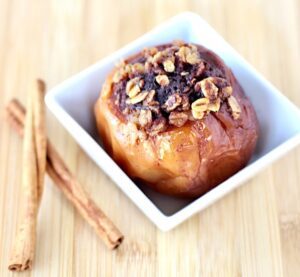 Baked Apple in a small white dish.