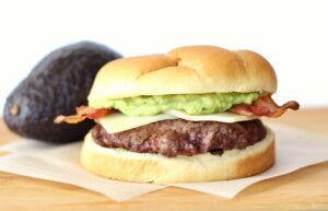 Bacon guacamole burger with cheese.