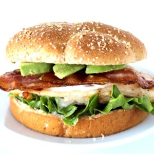 Bacon Avocado Ranch Grilled Chicken Sandwich on a bun.