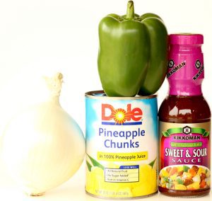 Sweet and sour sauce, green bell pepper, onion, and pineapple chunks.
