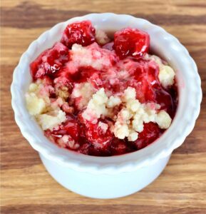 Cherry Dump Cake in a small bowl.