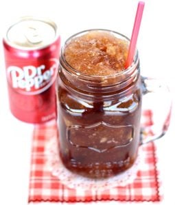 Dr. Pepper Slush in a jar with a straw.