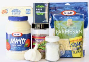 Ingredients including oregano, mayonnaise, and parmesan.