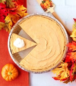 No-Bake Pumpkin Pie with graham cracker crust, cut with one slice of pie.