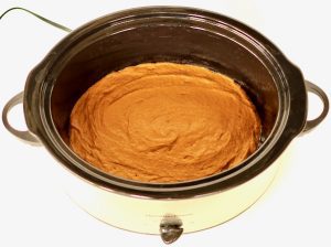 Slow Cooker with Pumpkin Spice Cake batter.