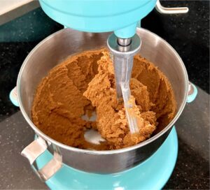 Ginger Snaps cookie dough in bowl of stand mixer.