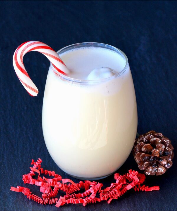 Eggnog Punch with Sprite in a wine glass.