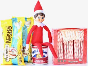 Elf with ingredients including condensed milk and candy canes.