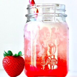 Strawberry Italian soda in mason jar.