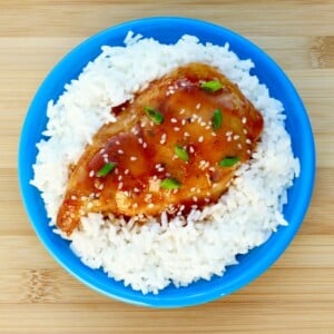 Honey garlic chicken on a bed of rice.