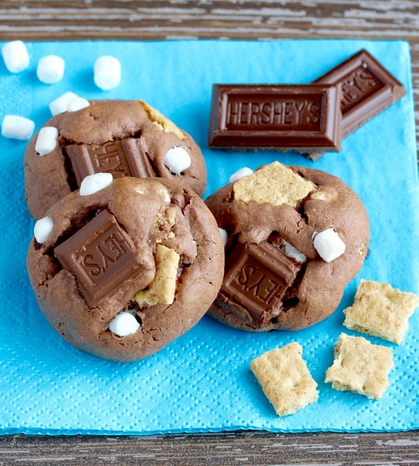 Baked S'mores cookies on a blue napkin.