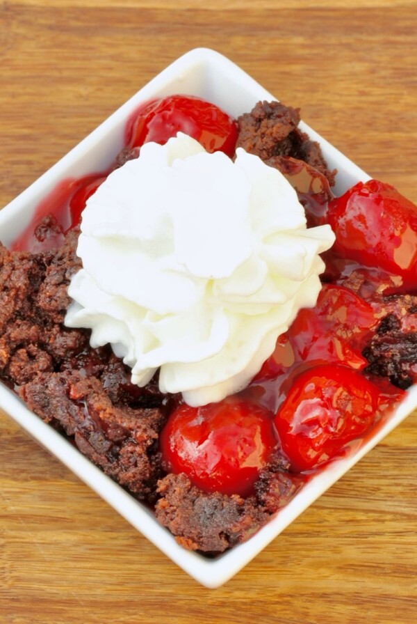White bowl of Chocolate Cherry Dump Cake.