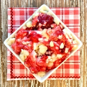 Bowl of Strawberry Cheesecake Dump Cake.