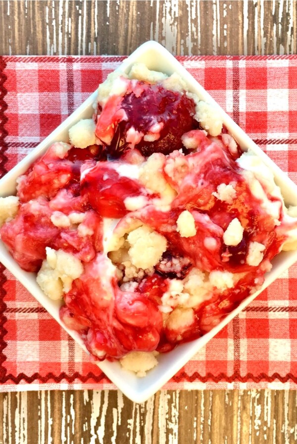 Bowl of Strawberry Cheesecake Dump Cake.