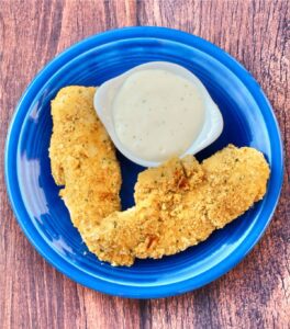 Buttermilk Ranch Chicken Tenders on a blue plate.
