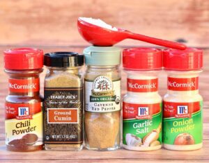 Ingredients including garlic salt, cumin, and chili powder.