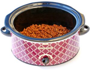 Seasoned ground beef taco meat in slow cooker.
