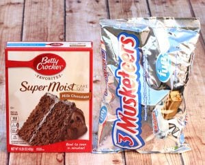 Box of milk chocolate cake mix and bag of 3 Musketeers candy bars.